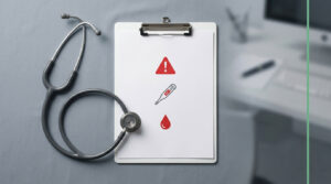 A stethoscope rests beside a clipboard with warning symbols and a thermometer illustration on a gray background.